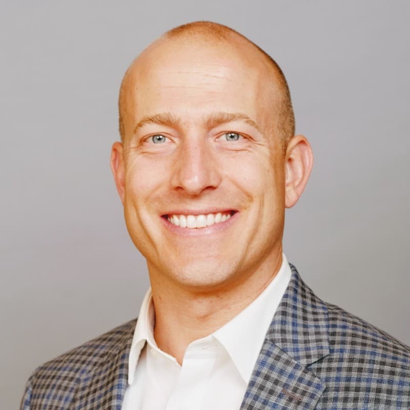 Professional headshot of the owner and founder
